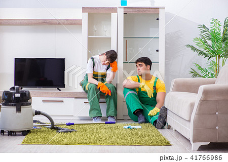 Cleaning professional contractors working at house 41766986