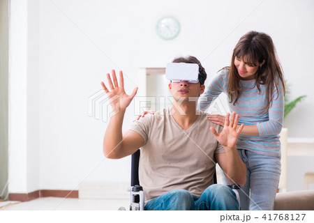 Disabled man with virtual glasses Disabled man with virtual glasses 41768127