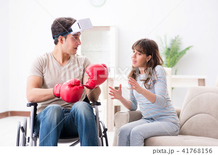 Disabled man with virtual glasses  41768156