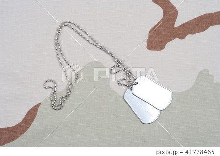 army camouflaged uniform with blank dog tags army camouflaged uniform with blank dog tags 41778465