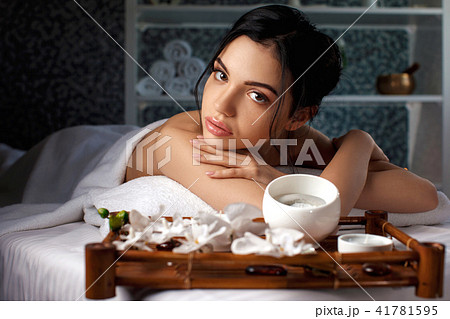 young woman in spa salon. 41781595