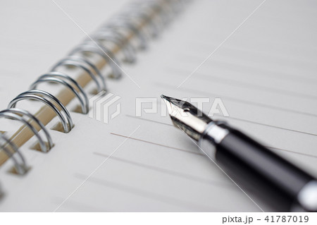 expensive pen on notebook 41787019