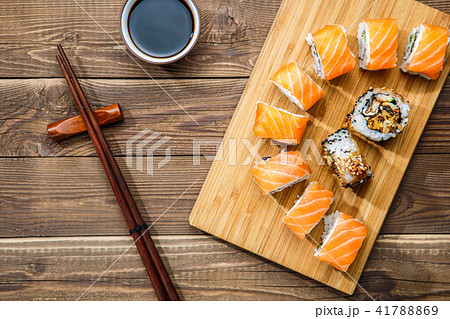 Rolls on board with chopsticks Rolls on board with chopsticks 41788869
