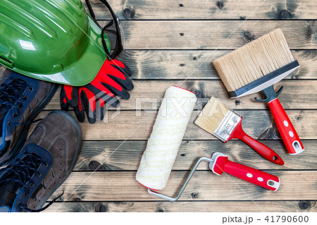 House painter, work tools on yellow background 41790600