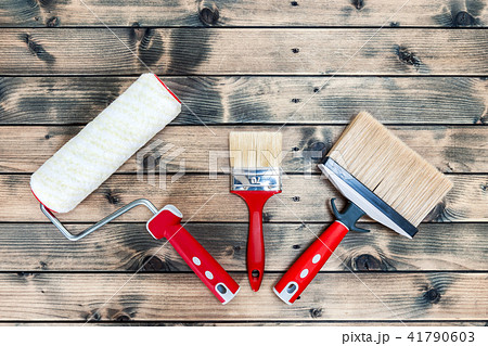 House painter, work tools on yellow background 41790603