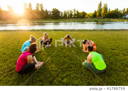 Group of active women training in the circle Group of active women training in the circle 41790759