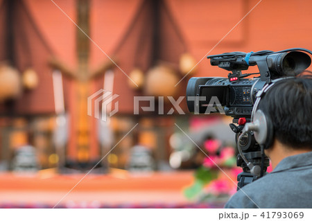 Closeup Video Cameraman taking photograp to the stage, event and seminar production equipment concept 41793069