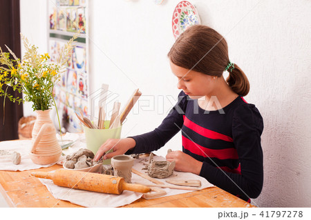 Child hands with plasticine Child hands with plasticine 41797278