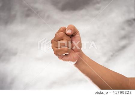 Fist on gray background Fist on gray background 41799828