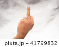 Hand showing rude sign on Gray background 41799832