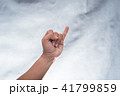 Woman hands on grey  background gesture of making  41799859