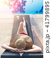 Real female beauty relaxing at swimming pool 41799895