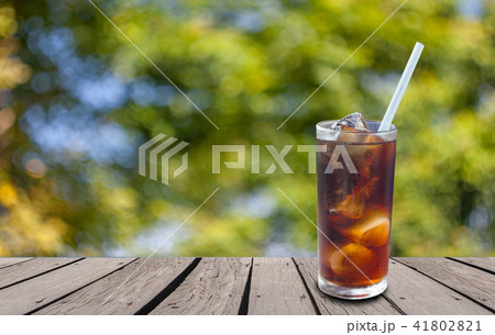 Glass of carbonated water Cola 41802821