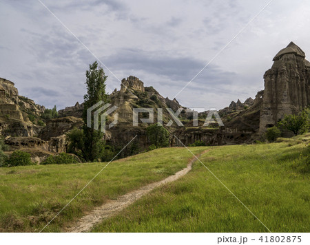 Trail to Cave house of Fairy Chimneys rocks mushroom in Pasabag, Monks Valley, Cappadocia, Turkey. 41802875