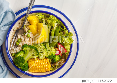 Vegan buddha bowl with brown rice, broccoli  41803721