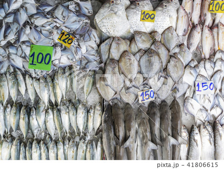 Top view display of fresh fishes on street market 41806615