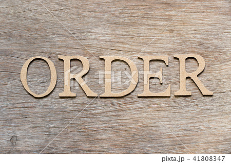 Alphabet letter in word order on wood background 41808347