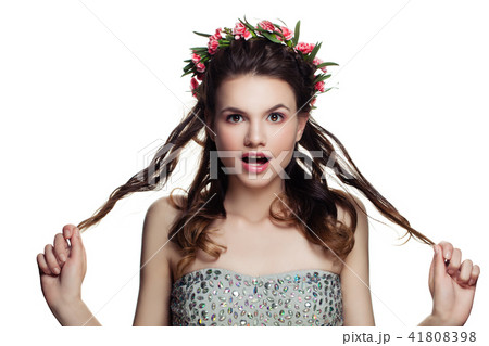Happy Woman with Perfect Hairstyle, Makeup and Flowers Isolated Happy Woman with Perfect Hairstyle, Makeup and Flowers Isolated 41808398