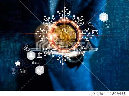 Bitcoin Cryptocurrency. Businessman holding tablet Bitcoin Cryptocurrency. Businessman holding tablet 41809433
