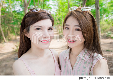 two beauty women selfie happily two beauty women selfie happily 41809746
