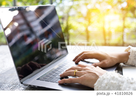 Business woman hands typing on laptop keyboard. 41810026
