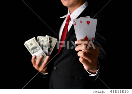 Gambling Concepts. Business people are gambling in the casino. B Gambling Concepts. Business people are gambling in the casino. B 41811810