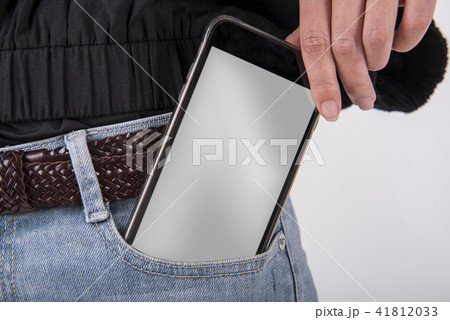 Mobile phone in jean pocket and blank screen  41812033