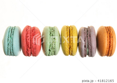 colored macaroons isolated on white background without a shadow closeup. Top view. Flat lay colored macaroons isolated on white background without a shadow closeup. Top view. Flat lay 41812165