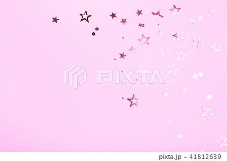 Golden stars on pink background Golden stars on pink background 41812639