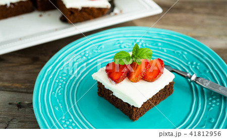 brownies with strawberry on a plate 41812956