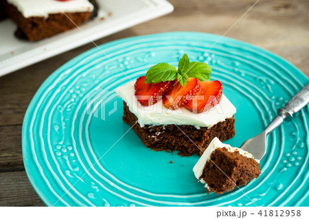 brownies with strawberry on a plate 41812958