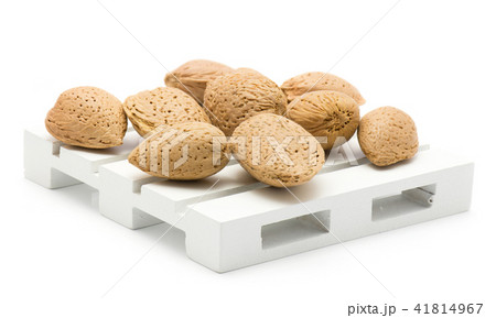 Raw almonds isolated on white Raw almonds isolated on white 41814967