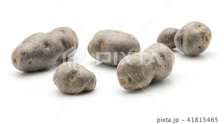 Fresh vitelotte potato isolated on white Fresh vitelotte potato isolated on white 41815465