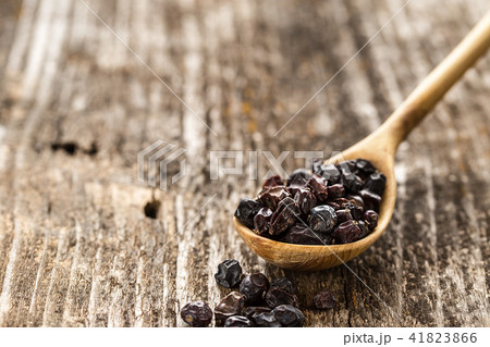 Spoon of barberry on a wooden background Spoon of barberry on a wooden background 41823866