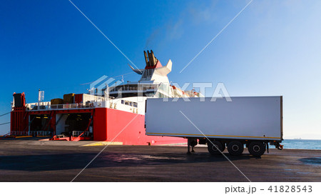 Ferry boat loading the truck on board in port. Ferry boat loading the truck on board in port. 41828543