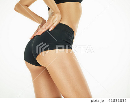 Muscular young woman athlete posing at studio Muscular young woman athlete posing at studio 41831055