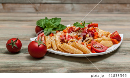 Penne pasta with vegetables and parmesan cheese Penne pasta with vegetables and parmesan cheese 41833546