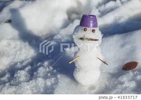 Sad snowmen. Spring came and the snow melts 41833717
