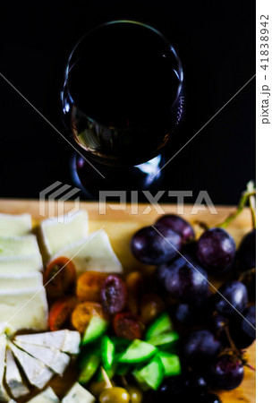Red wine and set of different cheeses  Red wine and set of different cheeses  41838942