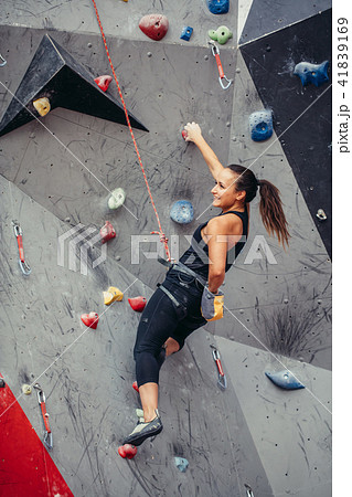 sporty woman in boulder climbing hall sporty woman in boulder climbing hall 41839169
