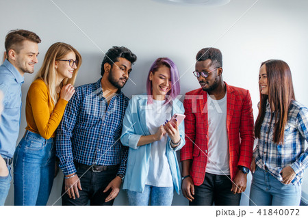 Multiethnic Group of Young People in Casual Wear isolated over grey background 41840072