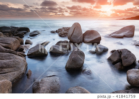 Seascape and rocks in sunset time. Seascape and rocks in sunset time. 41841759