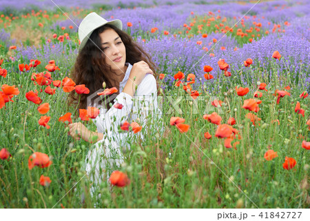 young woman portrait is in the lavender field young woman portrait is in the lavender field 41842727