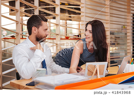 Joyful woman flirting with her boss 41843968