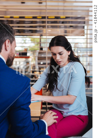 Ardent man touching a womans knee Ardent man touching a womans knee 41844112