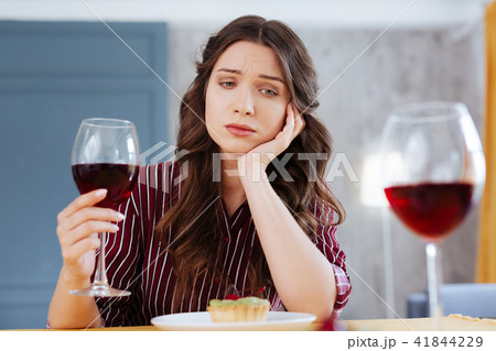 Green-eyed woman being left alone on Friday night 41844229
