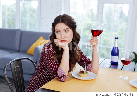 Appealing woman with nice hairstyle drinking wine 41844248