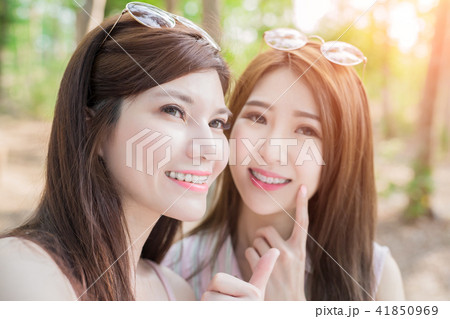 two beauty women selfie happily two beauty women selfie happily 41850969