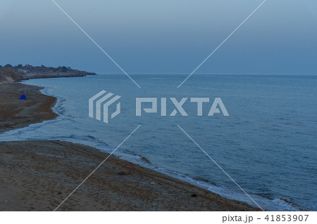 Sunset over the sea on wild beach of Persian gulf 41853907