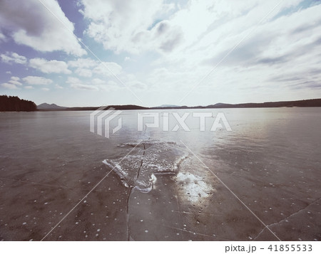 Beautiful transparent ice piece, Lake against sky 41855533